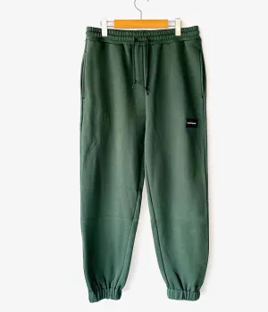 DESCENDANT/DEVICE SWEAT TROUSERS (GREEN)