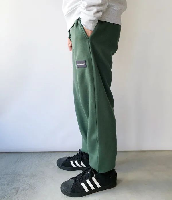 DESCENDANT/DEVICE SWEAT TROUSERS (GREEN)
