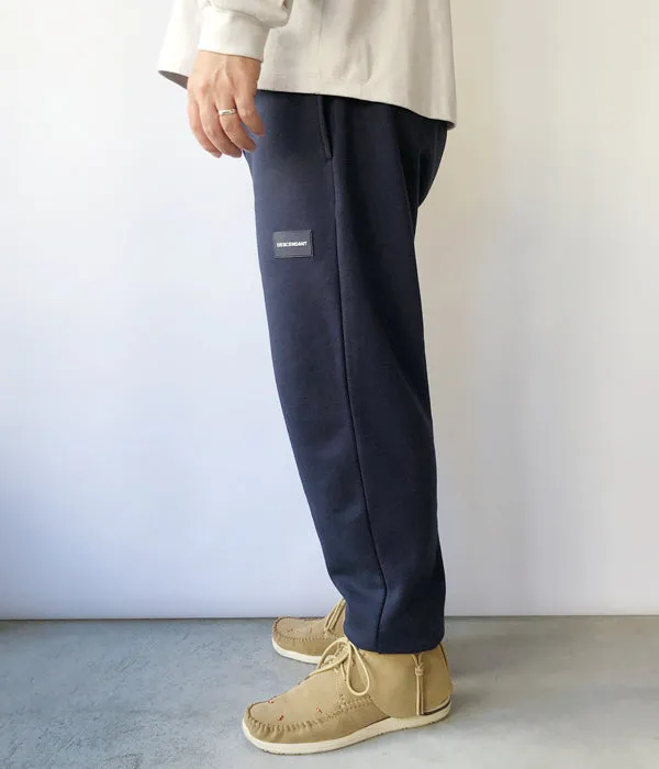 DESCENDANT/DEVICE SWEAT TROUSERS (NAVY)